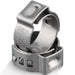 Macro of 3/8 inch single ear hose clamp; smooth inner band protects tubing as the ear compresses for a tight seal.